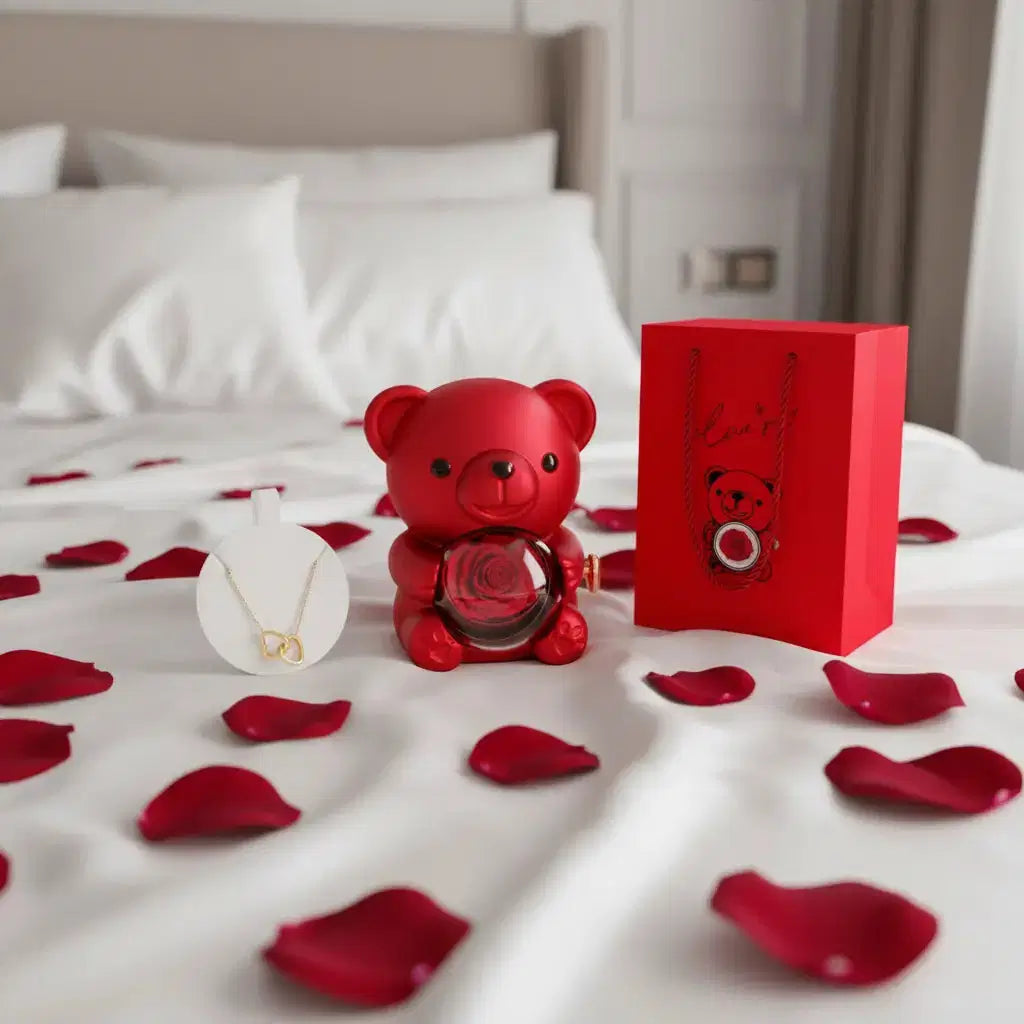 Ewiger Rosen-Teddybär Geschenkset by Amorlune featuring a plush bear with preserved roses in a decorative arrangement.