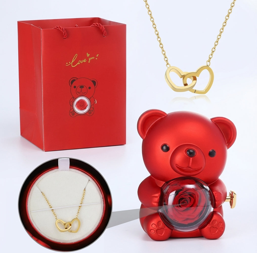 Ewiger Rosen-Teddybär Geschenkset by Amorlune featuring a plush teddy bear with preserved roses in a decorative arrangement.