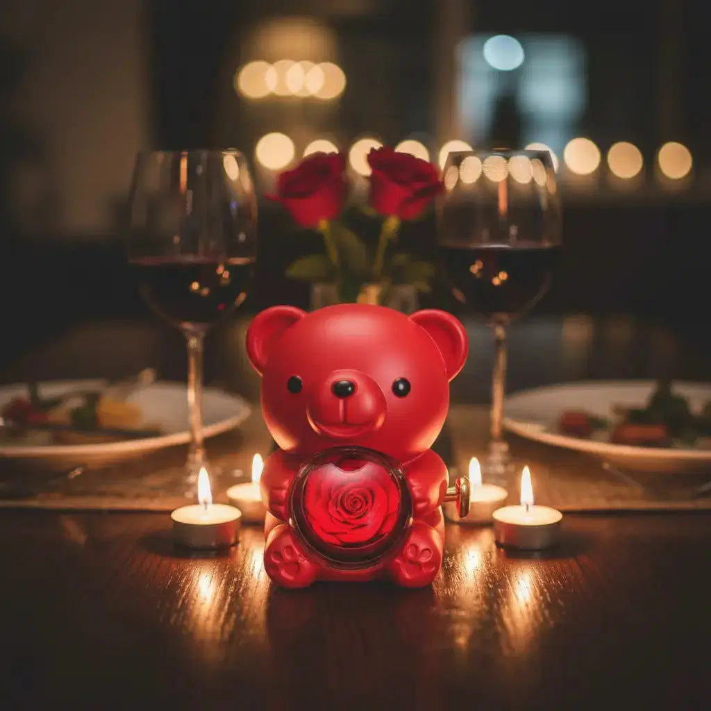 Ewiger Rosen-Teddybär Geschenkset by Amorlune featuring a plush teddy bear with preserved roses in a decorative arrangement.