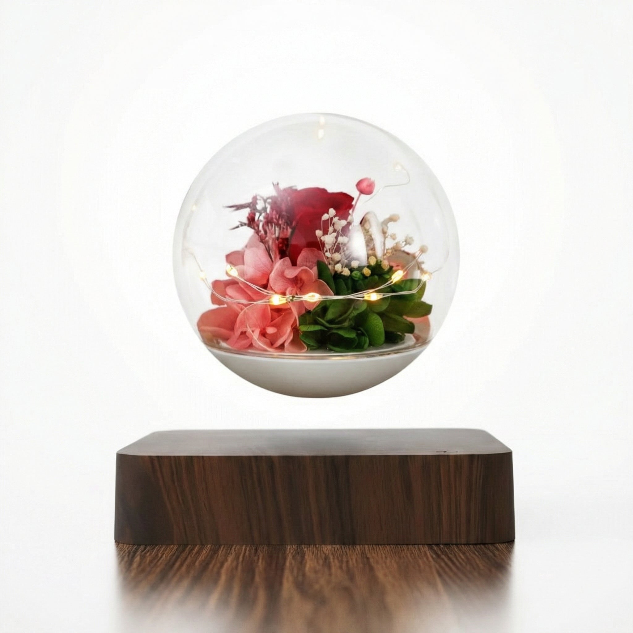 Magnetisch schwebende Rosenkugel von Amorlune, mit einer schwebenden Rosenblüte in elegantem Design.